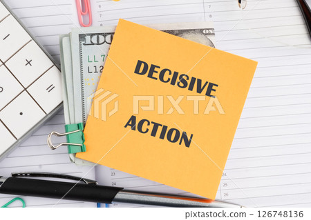 A conceptual phrase on the topic of DECISIVE ACTION business.. Finance and business concept. 126748136