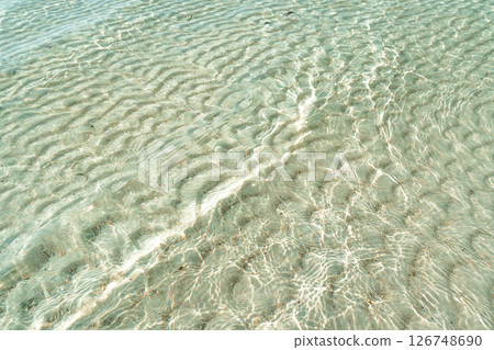 Shimmering Shallow Tropical Water with Sand Ripples Shimmering Shallow Tropical Water with Sand Ripples 126748690