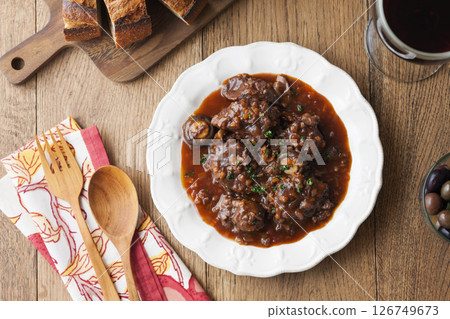 Braised snack meat with red wine 126749673