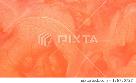 Shimmering orange fluid abstract. Swirls of bright tangerine blend with fine, iridescent glitter. evoking warmth, energy, and motion in a dazzling composition. 126750727