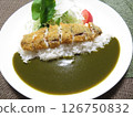 One-dish dinner: Spinach curry rice topped with fried horse mackerel and served with turnip salad 126750832