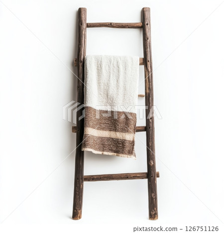 Rustic Wooden Ladder Displaying a Soft Towel in a Minimalist Setting 126751126