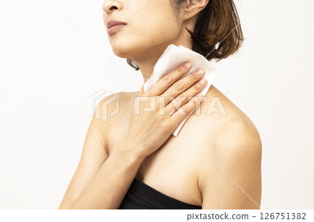 Woman using sweat wipe sheet 126751382
