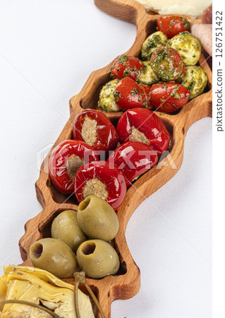 Platter of starter appetizer with olive and pepper 126751422