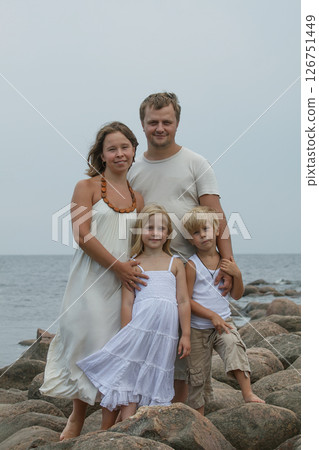 Loving family outdoors portrait. Father, mother, daughter and son 126751449