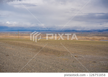 Flat valley near Kosh-Agach Altai Russia with expansive open landscape. Wide plain showcasing natural terrain and mountain surroundings 126751858