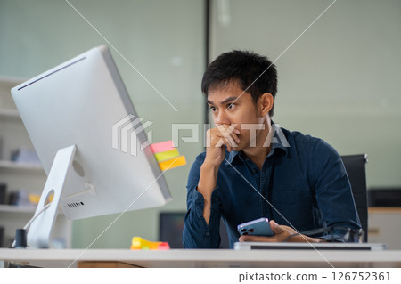 Businessman talking on the phone giving professional consultation to client or negotiating project. problems highlighting customer dissatisfaction. Businessman talking on the phone giving professional consultation to client or negotiating project. problems highlighting customer dissatisfaction. 126752361