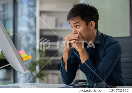 stressed asian businessman working in the office. Businessman thinking too much work concept in the office. 126752362