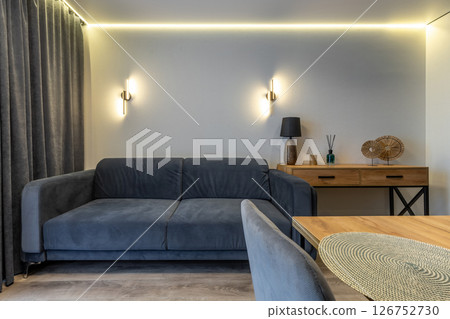 Cozy Living Area with Modern Console and Sofa Cozy Living Area with Modern Console and Sofa 126752730