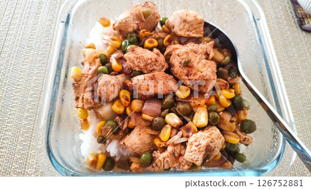 Chicken breast with rice, peas, corn and mushrooms in glass casserole dish Chicken breast with rice, peas, corn and mushrooms in glass casserole dish 126752881