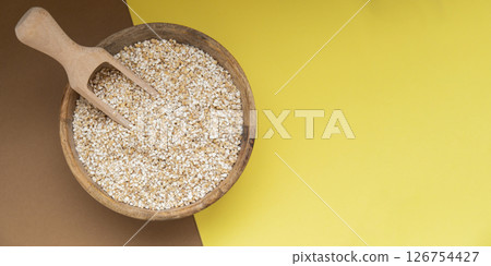 Fine ground barley copy space Whole spelt grain species. High protein fiber-rich vegan plant based food ingredient. Gluten free superfood healthy nutritional dietary alternative 126754427