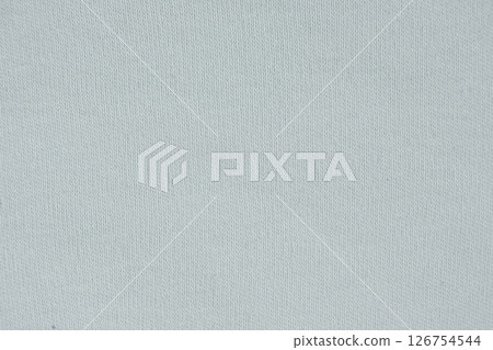 Macro texture of a fabric consisting of one hundred percent cotton. Macro texture of a fabric consisting of one hundred percent cotton. 126754544