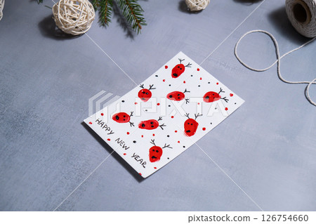Reindeer fingerprints Sustainable Christmas preparation Diy process of making handmade greeting cards. Step by step activity for children. Inclusive and responsible stress relief holiday hobby Reindeer fingerprints Sustainable Christmas preparation Diy process of making handmade greeting cards. Step by step activity for children. Inclusive and responsible stress relief holiday hobby 126754660