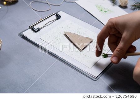 Christmas tree Storytelling of creating craft Christmas greeting card holiday present. Tactile hand-on activity. Master class progress of creative me-made gifts. Seasonal domestic life micro moment 126754686