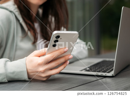 A person using a glucometer to check blood sugar levels, emphasizing healthcare, diabetes monitoring, and self-care practices. A person using a glucometer to check blood sugar levels, emphasizing healthcare, diabetes monitoring, and self-care practices. 126754825