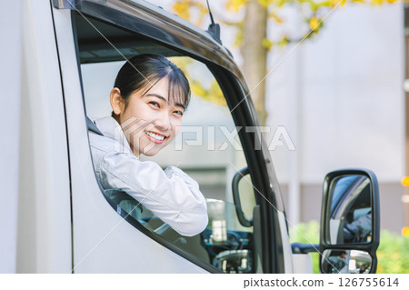 Young and cute delivery driver woman Young and cute delivery driver woman 126755614