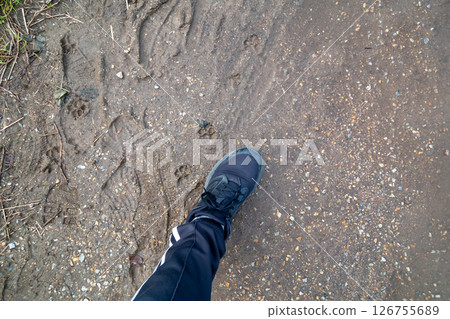 Walking on the road after the rain 126755689