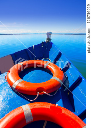 Blue boat sailing in Albufera lake of Valencia 126756929
