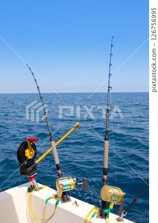 boat trolling fishing gear downrigger and two rods boat trolling fishing gear downrigger and two rods 126756995