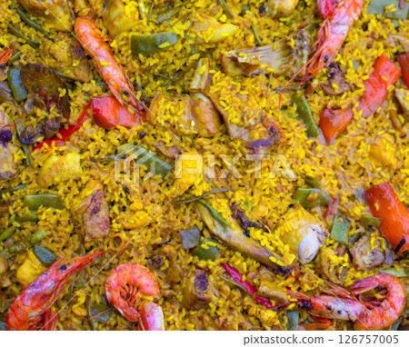 Spanish rice paella mixed of meat and seafood 126757005
