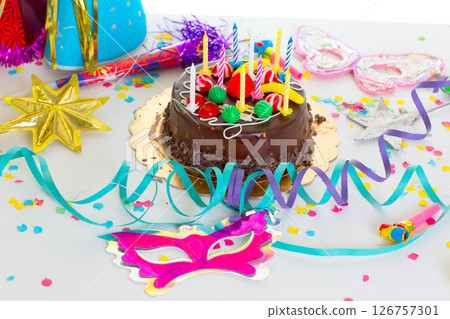 Children birthday party with chocolate cake 126757301