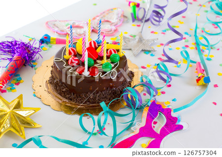 Children birthday party with chocolate cake Children birthday party with chocolate cake 126757304