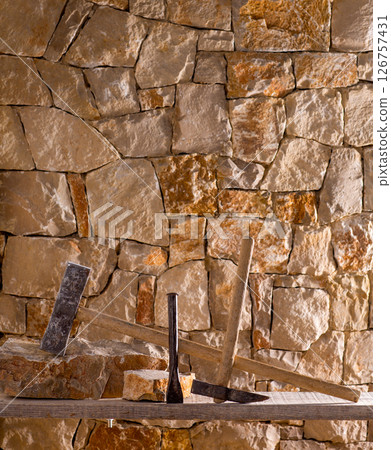 Hammer tools of stonecutter masonry work 126757431