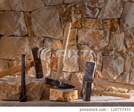 Hammer tools of stonecutter masonry work 126757435