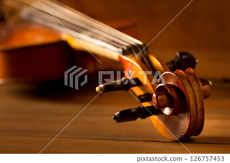 Classic music violin vintage in wooden background Classic music violin vintage in wooden background 126757453