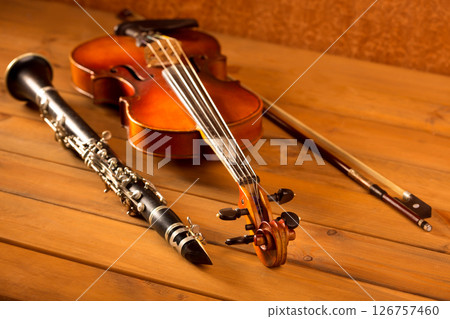 Classic music violin and clarinet in vintage wood Classic music violin and clarinet in vintage wood 126757460
