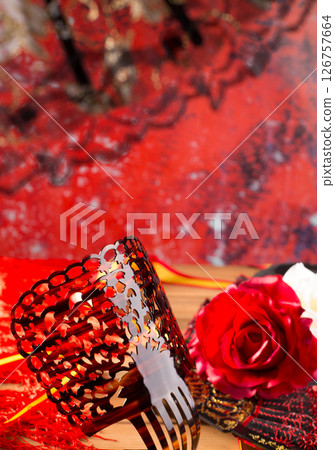 Flamenco comb fan and roses typical from Spain Espana 126757664