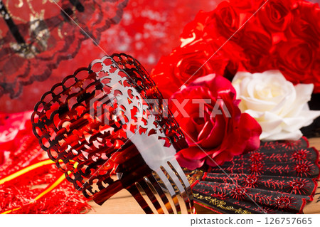 Flamenco comb fan and roses typical from Spain Espana Flamenco comb fan and roses typical from Spain Espana 126757665