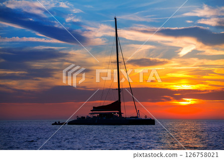 Ibiza san Antonio Abad catamaran sailboat sunset Ibiza san Antonio Abad catamaran sailboat sunset 126758021