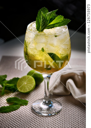 Mojito cocktail with ice, close up Mojito cocktail with ice, close up 126758973