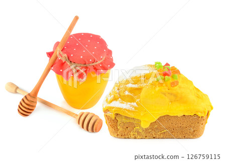 Cupcake honey and a jar of honey isolated on white. Collage. Free space for text. 126759115