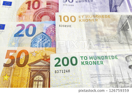 Stack of Euros and Danish Kroners 126759359
