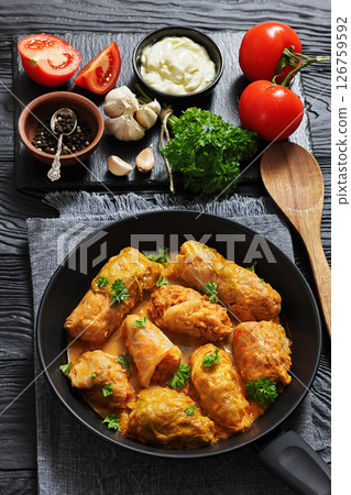 cabbage rolls with quinoa and ground meat filling cabbage rolls with quinoa and ground meat filling 126759592