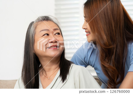 Wellness and Bonding. Mother and daughter sharing joyful moments at home. Wellness and Bonding. Mother and daughter sharing joyful moments at home. 126760000