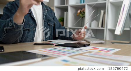 Design Development: Creative Individual Evaluating Color Options Design Development: Creative Individual Evaluating Color Options 126760472