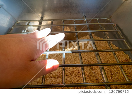 Brown rice inlet of a coin-operated rice polisher 126760715