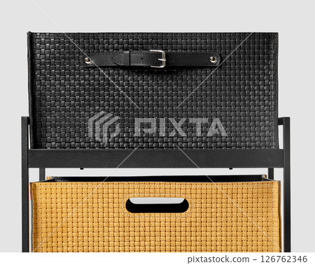 Modern black and yellow leather storage boxes with metal frame organizing home space 126762346