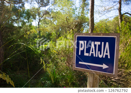Menorca track blue sign with Platja or beach arrow 126762792