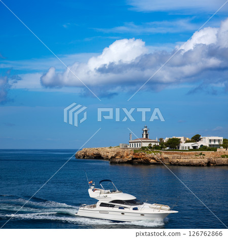 Ciutadella Sa Farola Lighthouse with yatch boat 126762866
