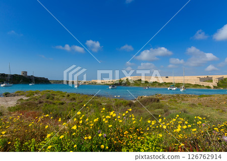 Menorca La Mola in Mahon with sailboats anchored Menorca La Mola in Mahon with sailboats anchored 126762914