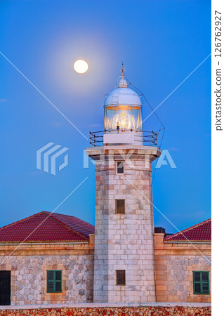 Ciutadella Menorca Punta Nati lighthouse moon shine 126762927
