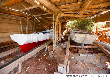 Formentera Cala Saona beach rail beached boats 126763051