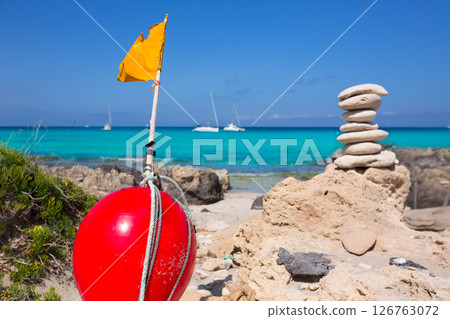 Stone figures on beach shore of Illetes beach in Formentera 126763072