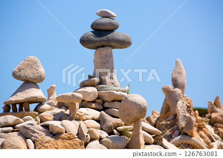 Stone figures on beach shore of Illetes beach in Formentera 126763081