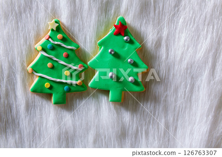 Christmas cookies Xmas tree shape on white fur 126763307