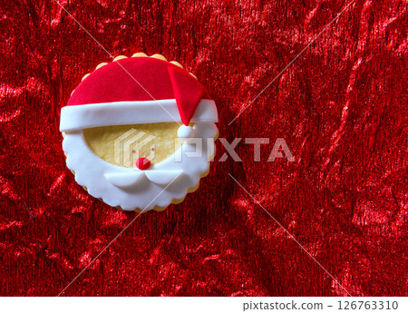 Christmas cookies Santa face on red background 126763310